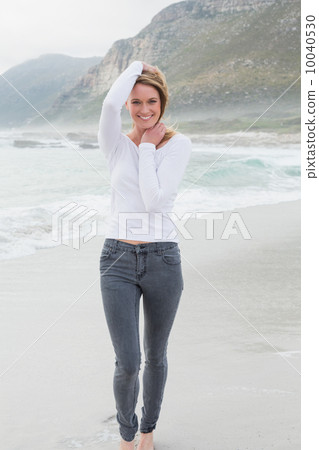 Portrait of a beautiful casual woman at beach Portrait of a beautiful casual woman at beach 10040530