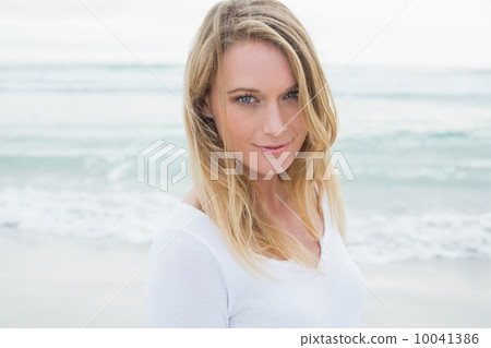 Close-up portrait of a casual woman at beach Close-up portrait of a casual woman at beach 10041386
