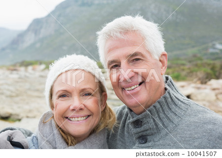 Senior couple together on rocky landscape Senior couple together on rocky landscape 10041507
