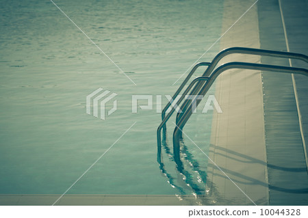 Ladder of a swimming pool Ladder of a swimming pool 10044328