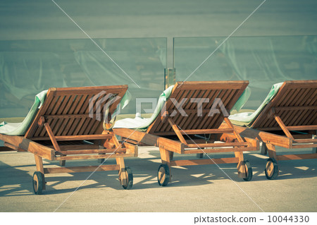 Hotel Poolside Chairs with Sea view Hotel Poolside Chairs with Sea view 10044330