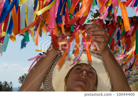 Woman makes a wish Woman makes a wish 10044400