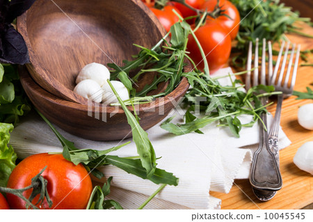 background from mixed vegetables with wood bowl background from mixed vegetables with wood bowl 10045545