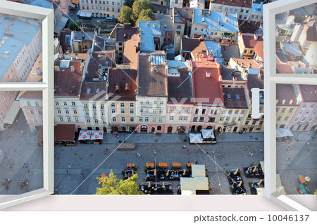 opened window to the roofs of city 10046137
