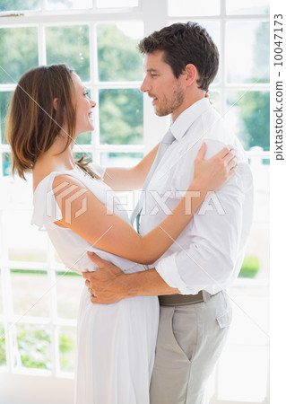 Loving young couple looking at each other Loving young couple looking at each other 10047173