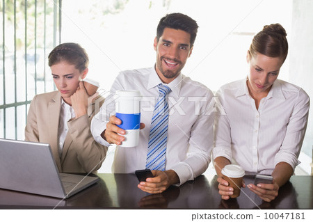 Team during break time in office cafeteria Team during break time in office cafeteria 10047181