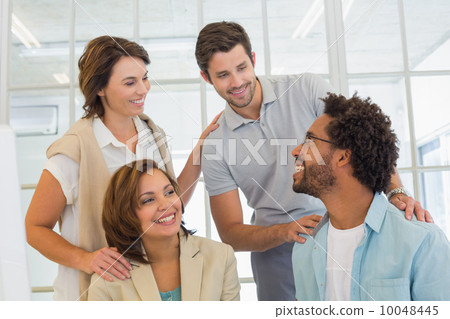 Business people having a conversation in office Business people having a conversation in office 10048445