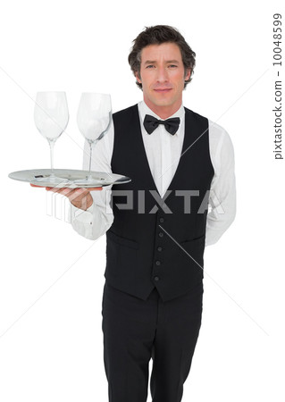 Server carrying wine glasses over white background Server carrying wine glasses over white background 10048599