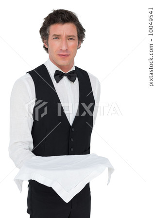 Confident server holding tray against white background Confident server holding tray against white background 10049541