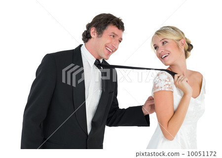 Playful couple looking at each other Playful couple looking at each other 10051172