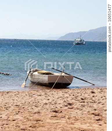 old boat on beach old boat on beach 10051477
