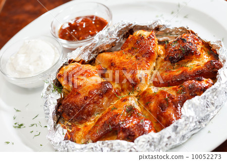 Chicken wings with sauce Chicken wings with sauce 10052273