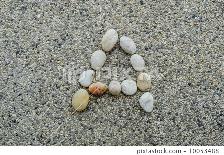A - Letter alphabet stones laid out on the granite 10053488