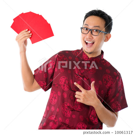 Asian Chinese man showing many red packets 10061317