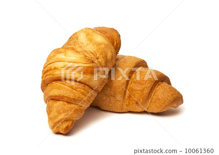 two croissants isolated on white background two croissants isolated on white background 10061360