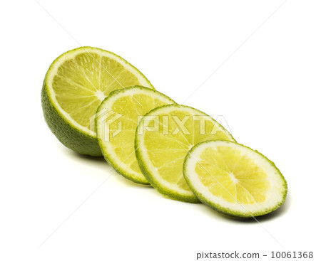 Slice of fresh lime isolated on white background Slice of fresh lime isolated on white background 10061368