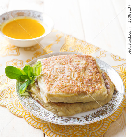 Middle east stuffed bread Mutabbaq Middle east stuffed bread Mutabbaq 10062137