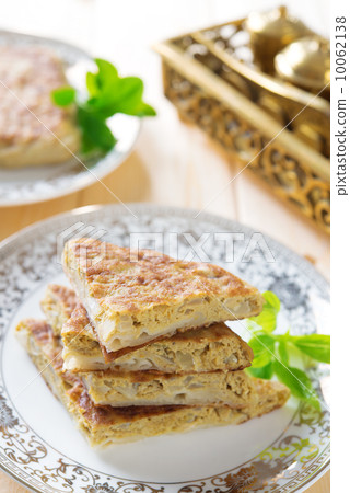 Stuffed Arabic bread Mutabbaq Stuffed Arabic bread Mutabbaq 10062138