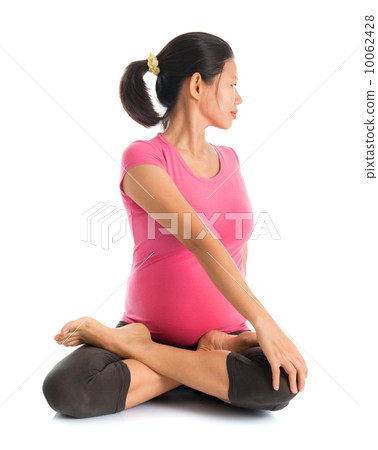 Pregnant yoga position 10062428
