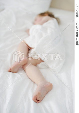 Adorable toddler girl's little feet Adorable toddler girl's little feet 10063272