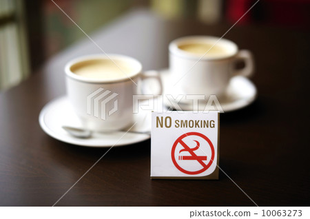 Two coffee cups and no smoking sign Two coffee cups and no smoking sign 10063273