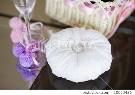 Two wedding rings on a pillow Two wedding rings on a pillow 10063426