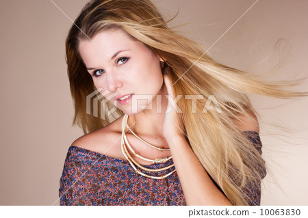 Beautiful blonde girl with long flying hair Beautiful blonde girl with long flying hair 10063830