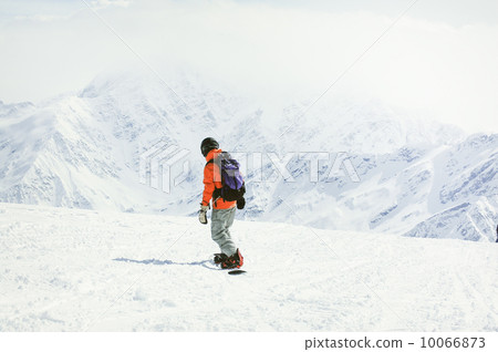 Snowboarder in action Snowboarder in action 10066873