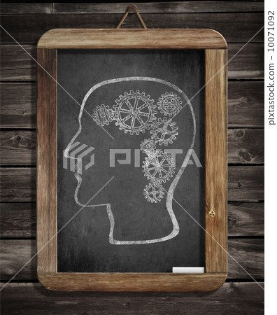 Human brain mechanism with cogs and gears drawn by chalk on blac Human brain mechanism with cogs and gears drawn by chalk on blac 10071092
