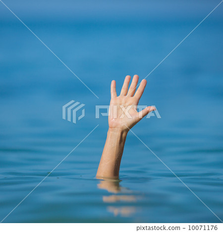 hand of drowning man in sea asking for help 10071176