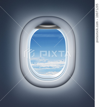 Airplane interior or jet window with clouds and sky. 10071205