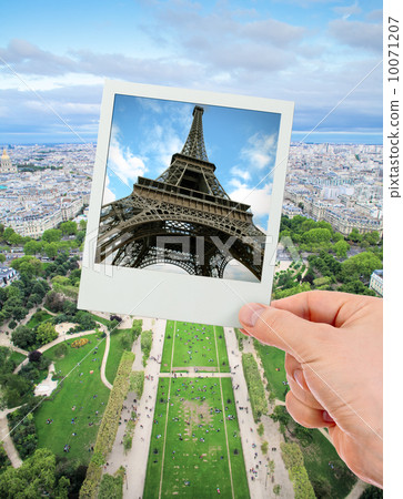 Polaroid frame of Eiffel tower over The Champ de Mars of Paris 10071207