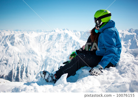 Young happy couple in snowy mountains. Young happy couple in snowy mountains. 10076155