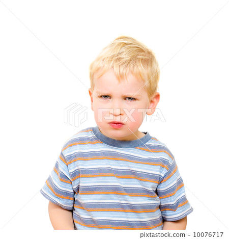 Angry and serious beautiful boy isolated on white 10076717