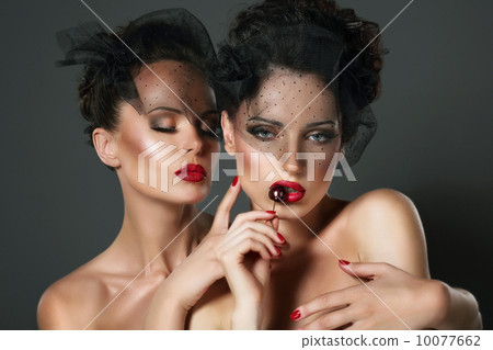 Aspiration. Hanker. Two Sexy Desirable Women in Erotic Embrace Hugging 10077662