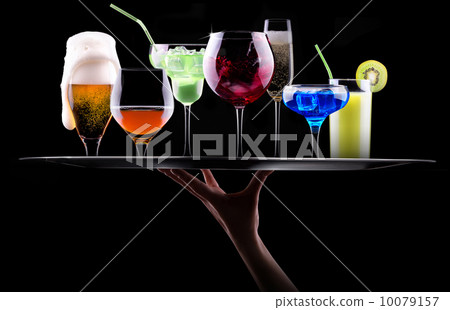 different alcohol drinks set on a tray 10079157