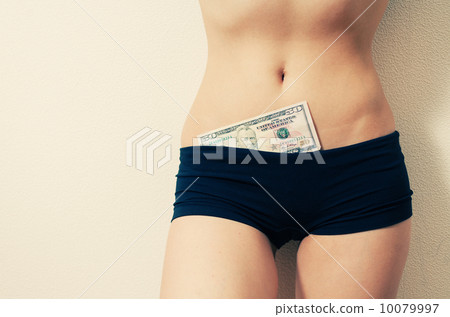 Female in shanties (tight shorts) with 50 dollar bill Female in shanties (tight shorts) with 50 dollar bill 10079997