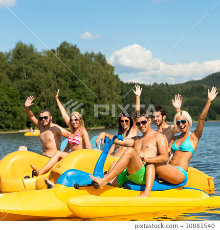Young students paddling on water fun time Young students paddling on water fun time 10081540