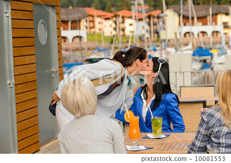 Woman leaving from outdoor restaurant terrace Woman leaving from outdoor restaurant terrace 10081553