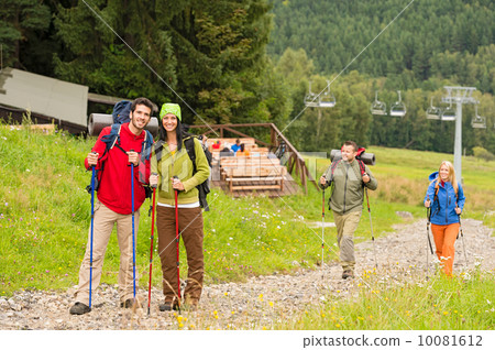 Hiker couples following path on mountain Hiker couples following path on mountain 10081612