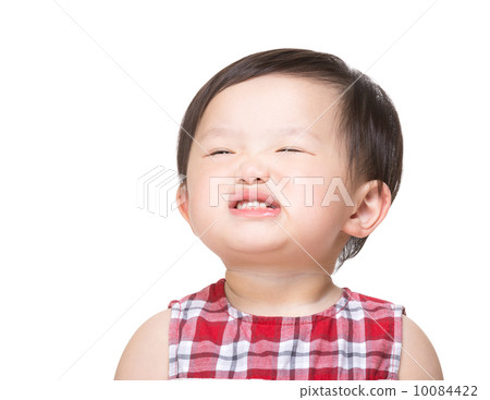 Asiab baby girl making funny face 10084422