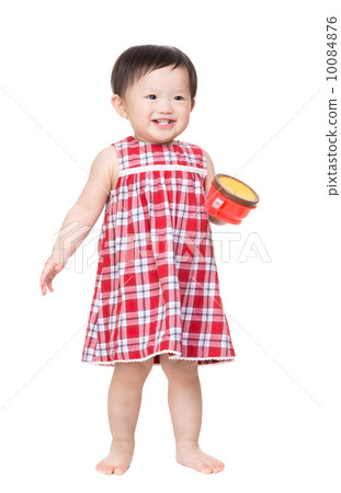 Baby Girl standing with snack box Baby Girl standing with snack box 10084876