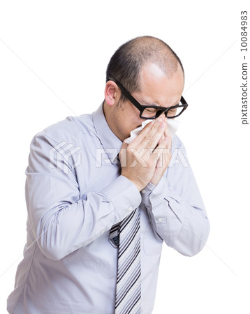 Businessman sneezes Businessman sneezes 10084983