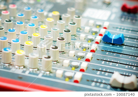 DJ turntable sound mixer in nightclub 10087140