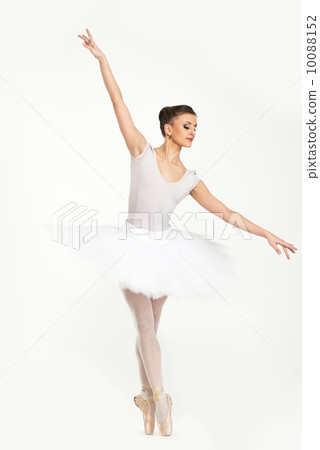 Young ballerina dancer in tutu showing her techniques Young ballerina dancer in tutu showing her techniques 10088152