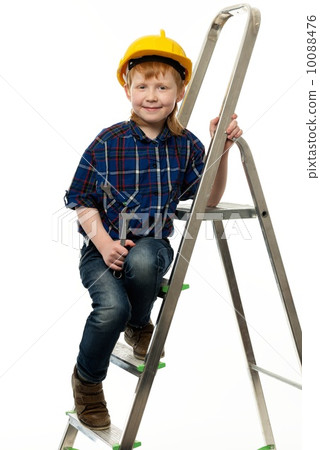 Little boy in protective helmet with wrench tool on a ladder 10088476