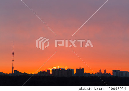 early red dawn over city 10092024