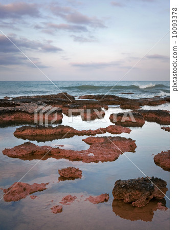 Bright red stones on the coast of Mediterranean Sea. Bright red stones on the coast of Mediterranean Sea. 10093378