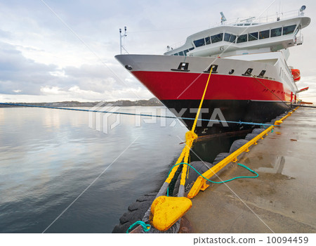 Big modern passenger cruise ship moored in Rorvik, Norway Big modern passenger cruise ship moored in Rorvik, Norway 10094459
