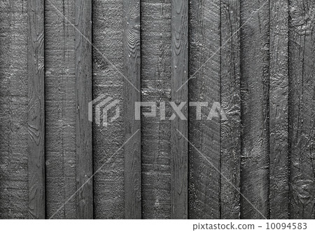 Background texture of old black painted wooden lining boards wall 10094583